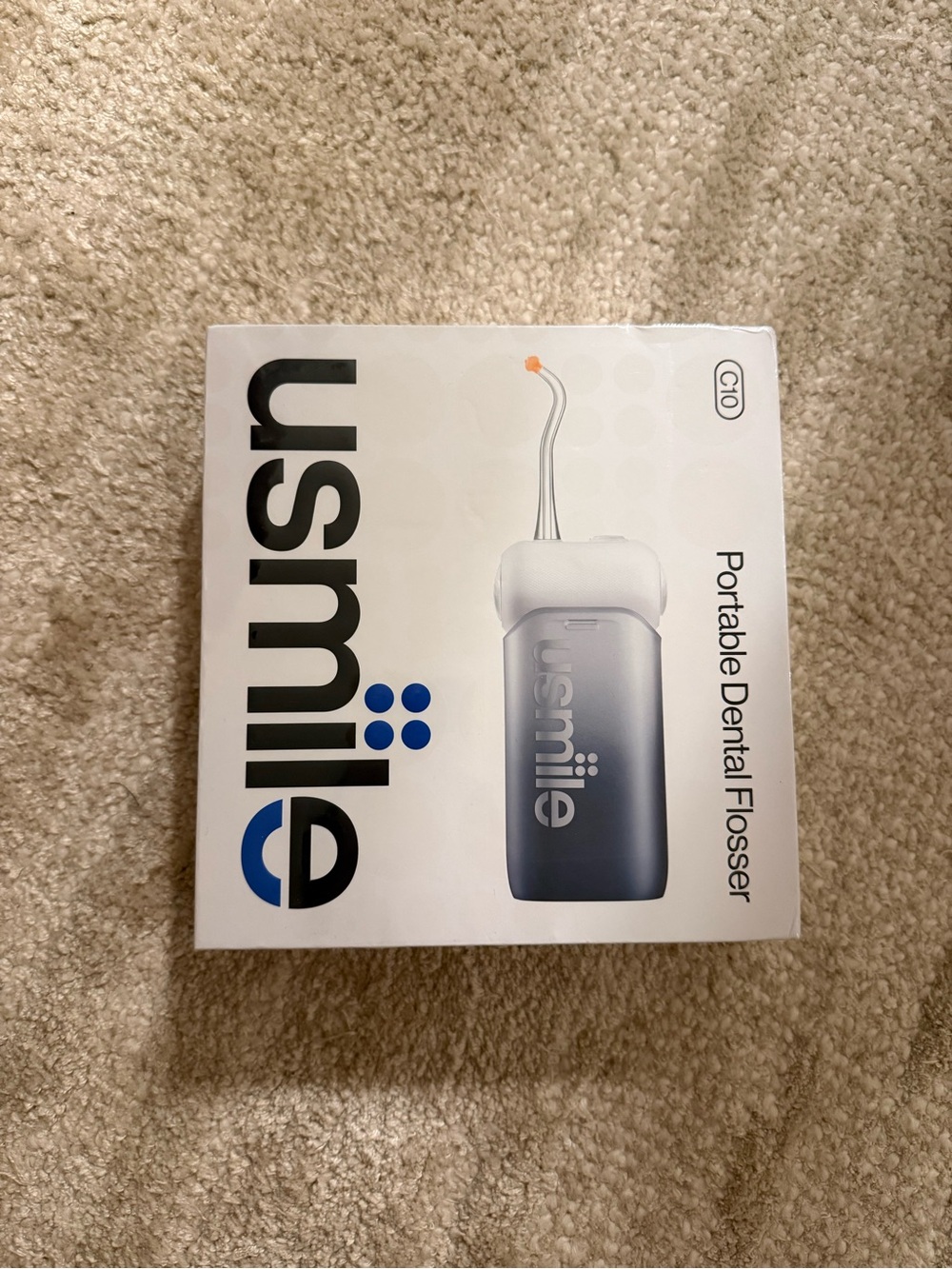 NIB Usmile portable dental flosser